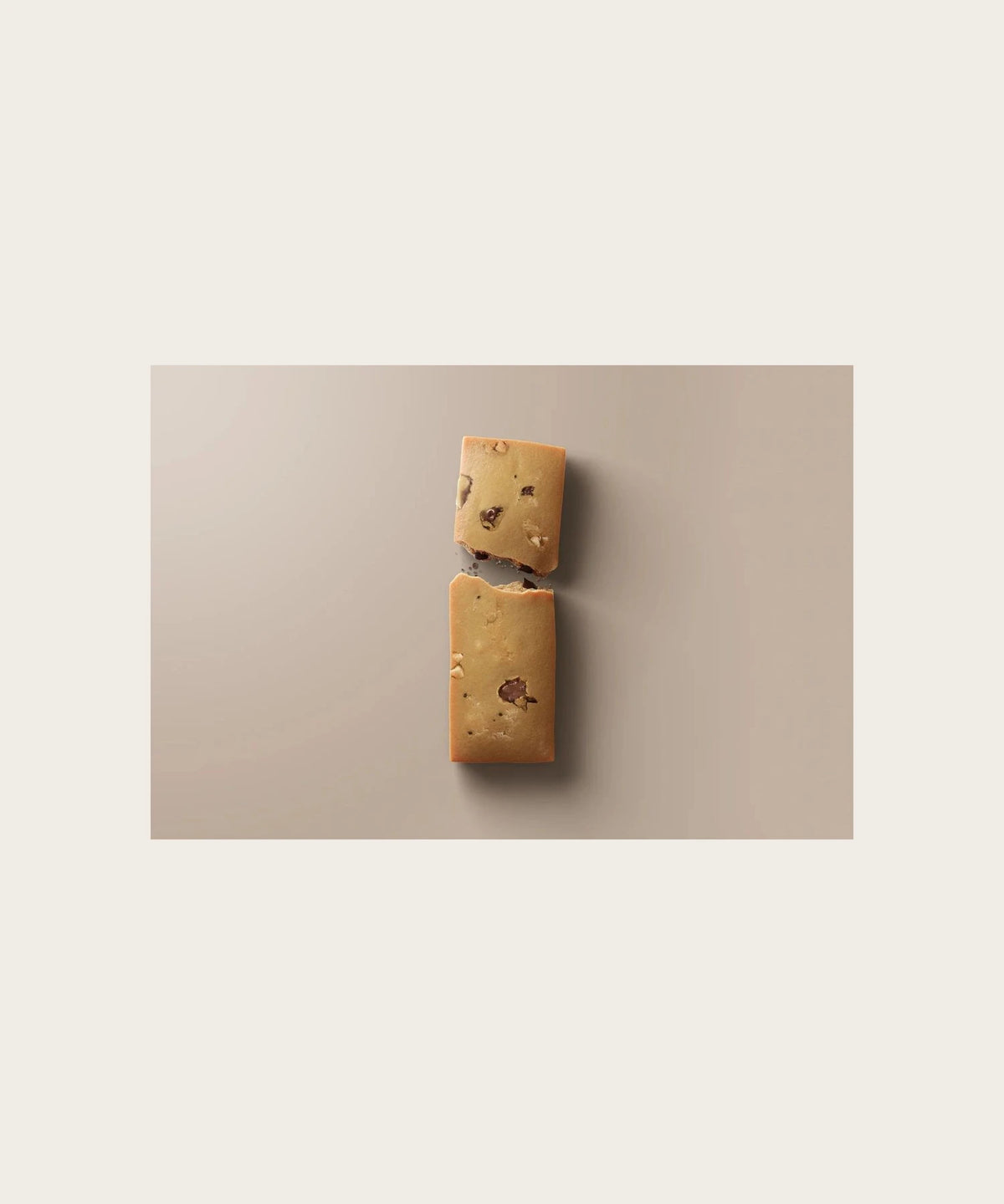 Stars + Honey Cacao Salt Caramel Peanut bar broken to show texture