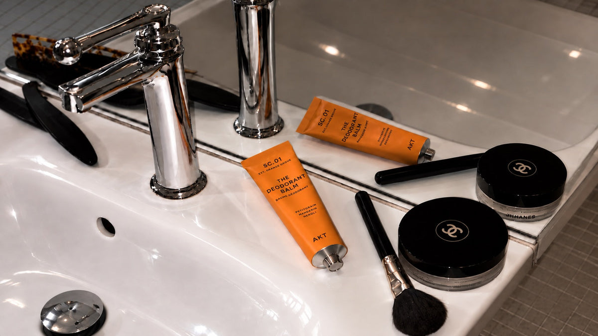 AKT The Deodorant Balm SC.01 Orange Grove on a bathroom sink